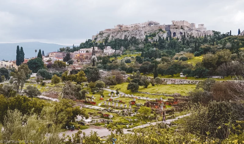 Ancient Agora in the foreground and a view of the Acropolis in the background. 
