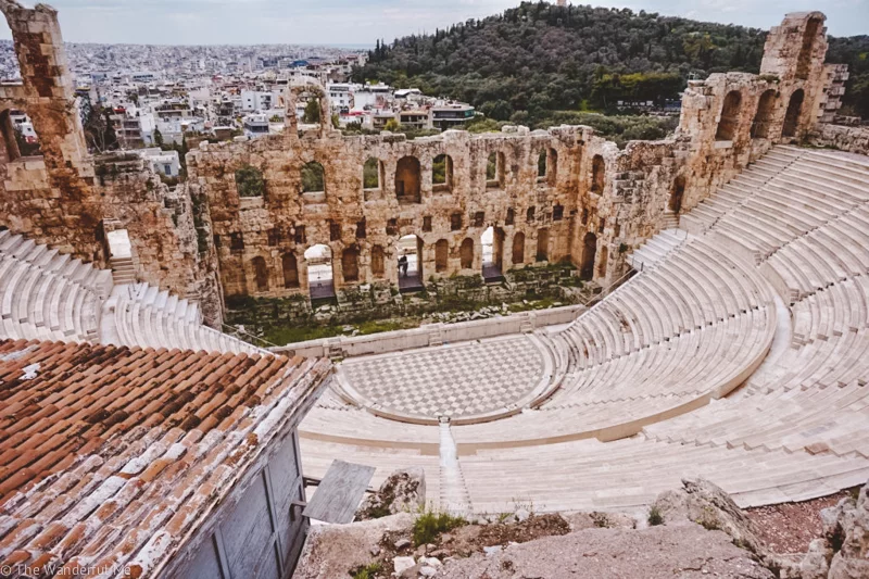 A photo of the Theatre of Dionysus Eleuthereus, a popular theater in ancient Greece.