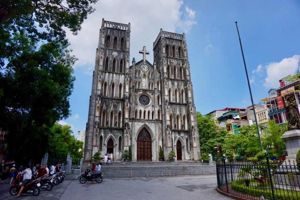 St. Joseph's Cathedral standing tall -- one of the must-visit places in Hanoi, Vietnam, and a fabulous thing to see on a month long Vietnam trip.