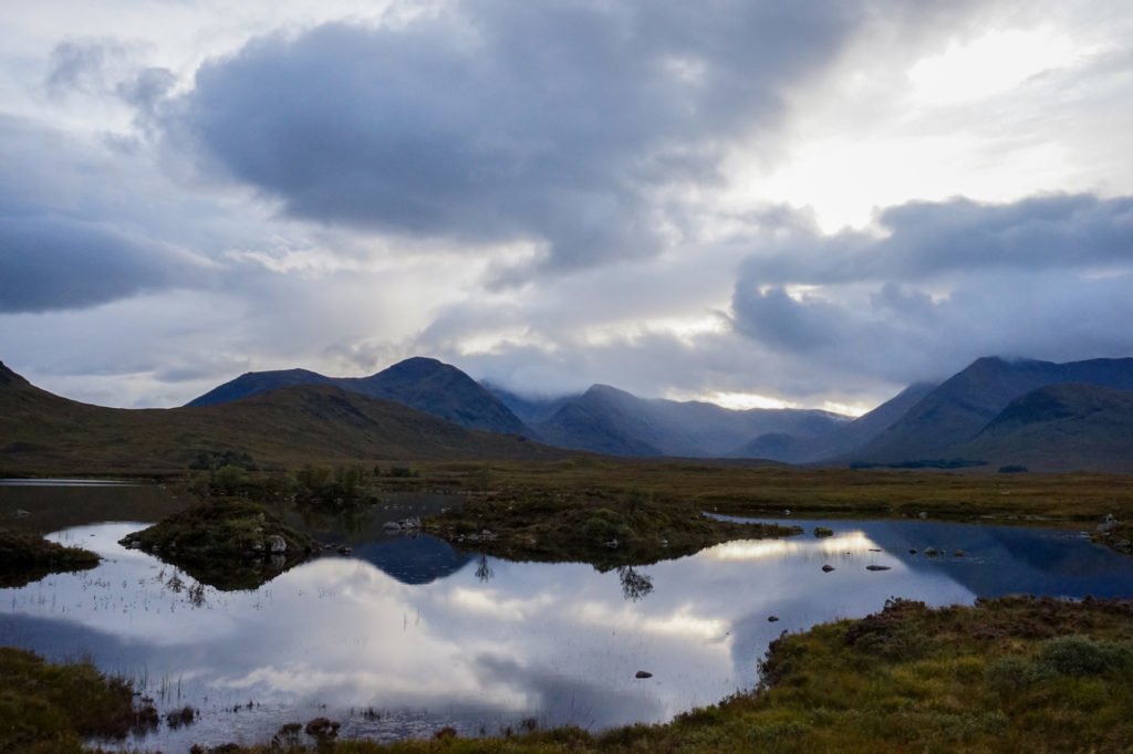 A Still Lake in the Scottish Highlands • Discovering the Wild Side of Wild Camping in Scotland | The Wanderful Me
