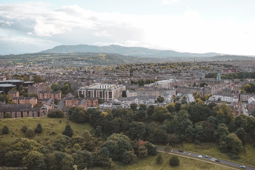 Overlooking the city of Edinburgh, a great place to explore on a sustainable tour.
