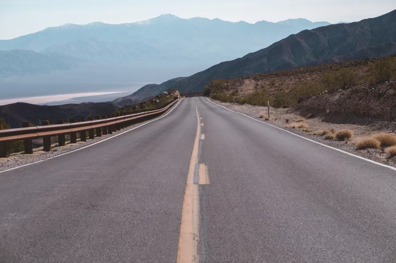 A wide open road, just waiting for you to rent an RV for your next trip so you can venture down it!