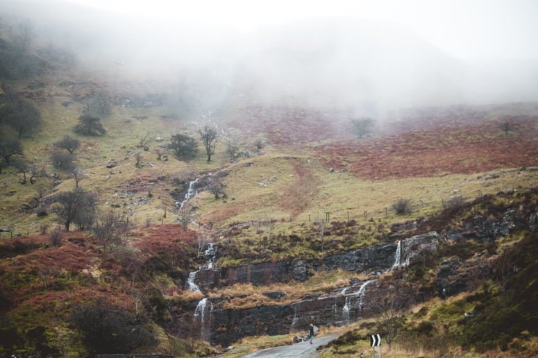Waterfalls cascading down a mountain in Brecon Beacons National Park. A must-visit spot in Wales!