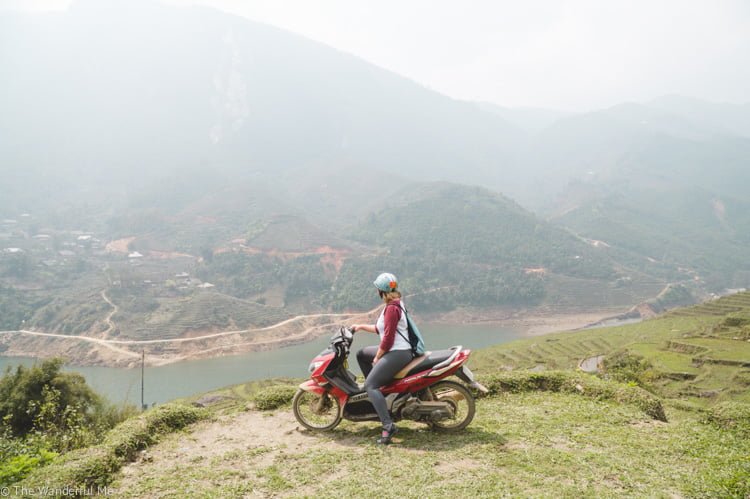 Sophie motorbiking around the towering mountains and lush rice paddies in Sapa, Vietnam.