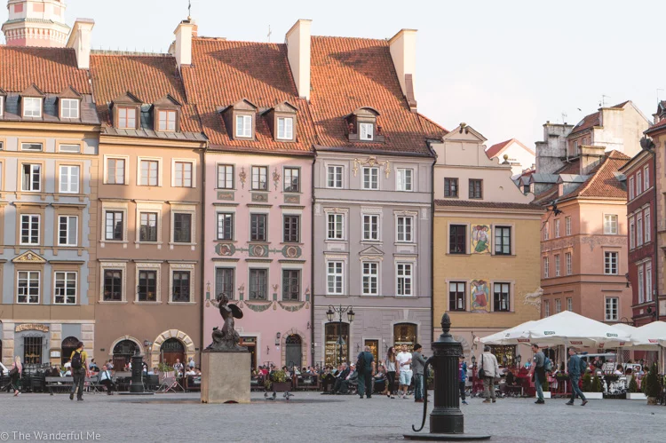 Crayola-colored buildings that line one of the main squares in Warsaw, Poland. 