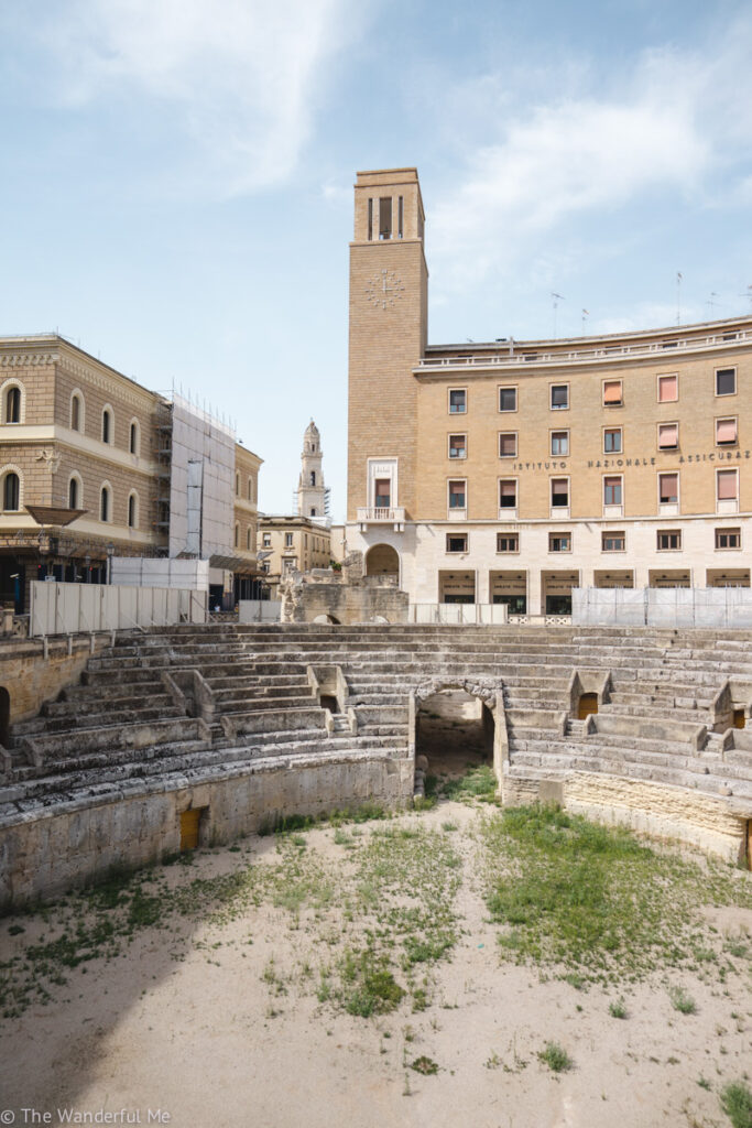 Lecce Roman Amphitheatre (Anfiteatro Romano di Lecce) in Lecce, Italy, with a view of its former seating area and arena. 